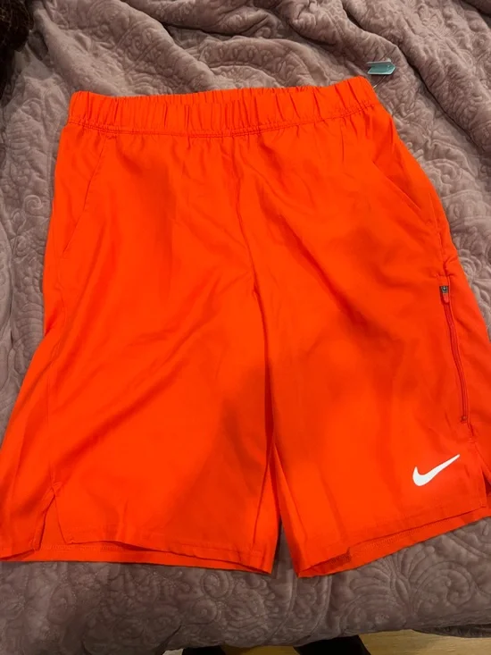 Nike Men’s Bright Orange Athletic Shorts with White Swoosh