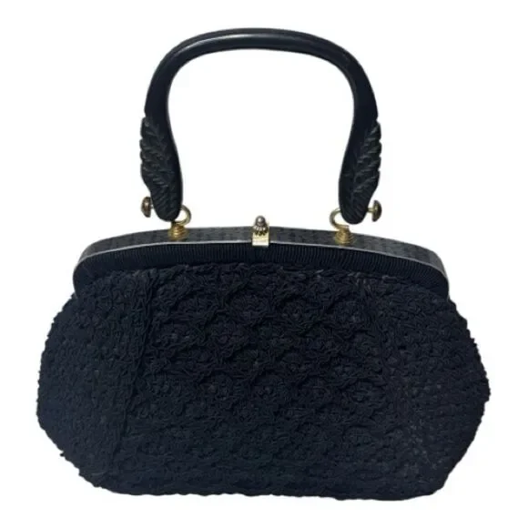 Vintage 60’s Black Knit Dumpling Bag With Silver And Gold Fixtures.