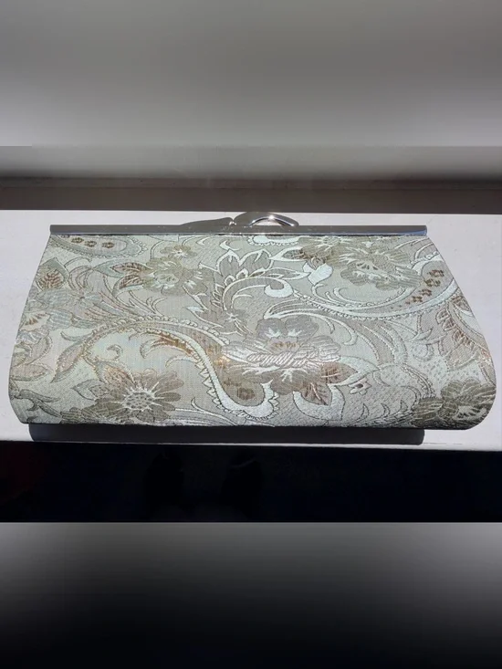 Viintage-style evening clutch features gold/green floral damask metal kiss lock