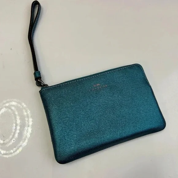 ! Coach metallic green  Leather Wristlet,