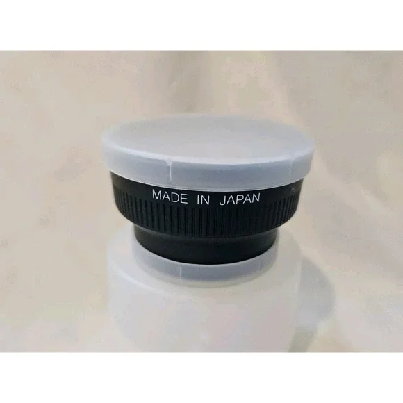Wide angle lens made in Japan,‎ listed with Both Lens caps