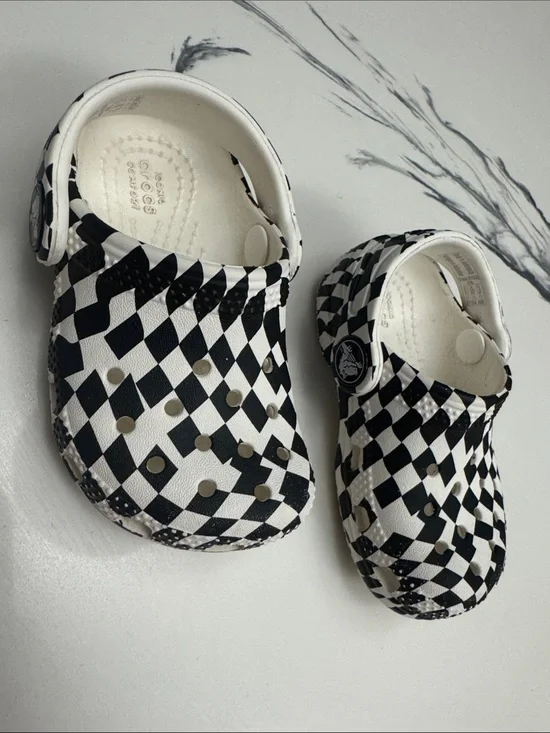 CROCS Kids Checkerboard Slip-On Clogs in Black and White