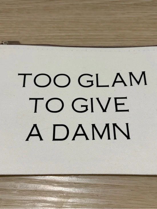 White Canvas Zip Makeup Pouch with Bold Black Slogan. 8x6”