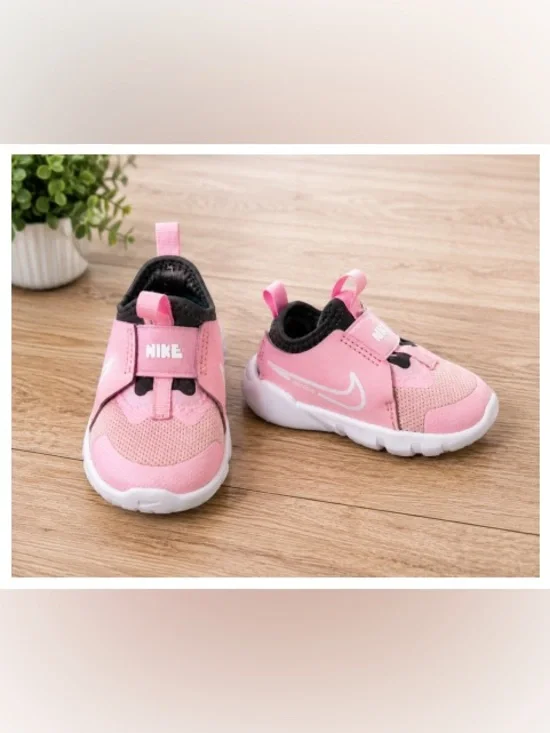Nike Pink Toddler Slip-On Athletic Sneakers with White Swoosh