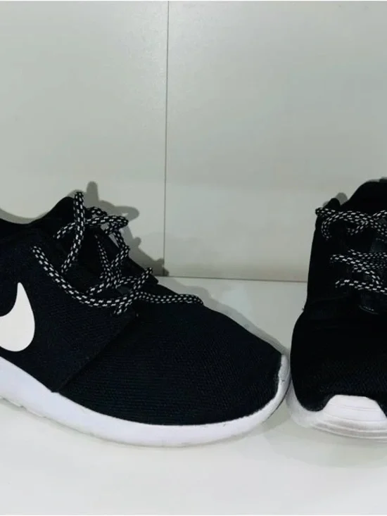 Nike Men’s Black Sneakers with White Swoosh and White Sole