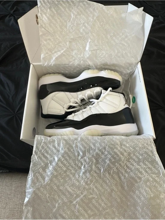 Air Jordan’s 11 Never Been Worn Black and White High-Top Athletic Sneakers