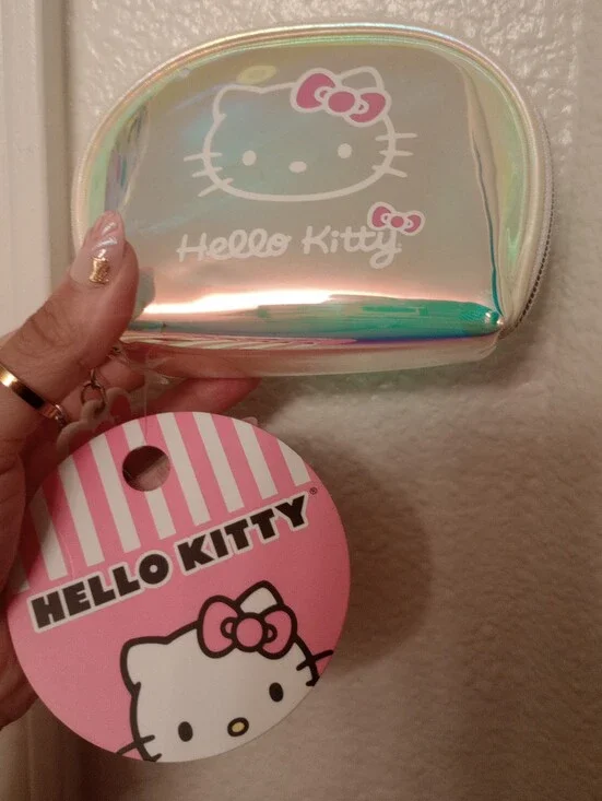 Hello Kitty Iridescent Holographic Cosmetic Pouch with Pink Bow Zipper  Accent
