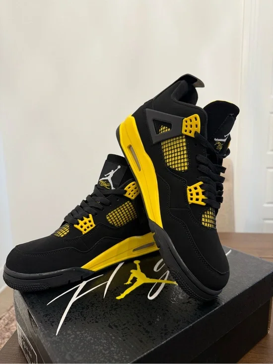 Nike Black and Yellow Retro High-Top Sneakers