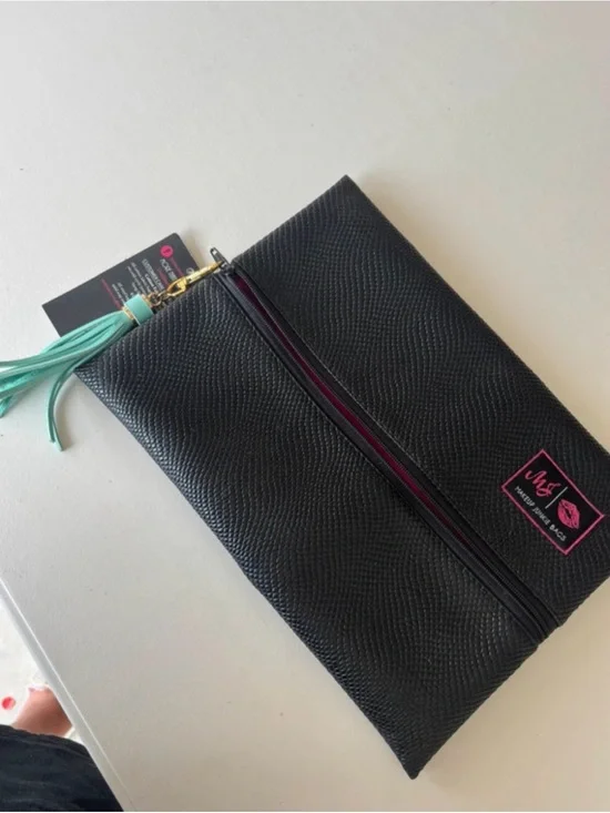 Black Cosmetic Pouch with Mint Tassel and Pink Trim
