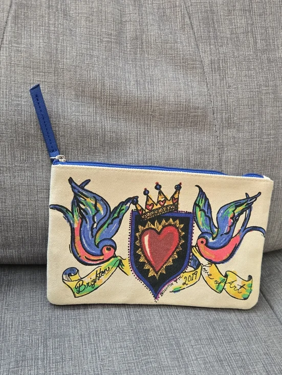 Brighton Cream Canvas Cosmetic Pouch with Blue Trim and Multicolor Heart Artwork