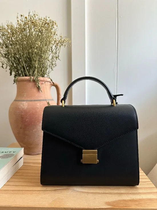 Quince black leather top-handle bag