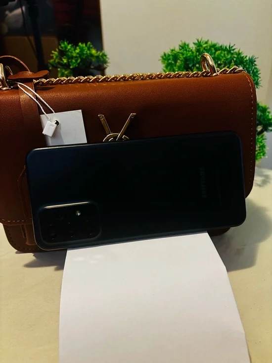 Sleek Brown crossbody bag with gold