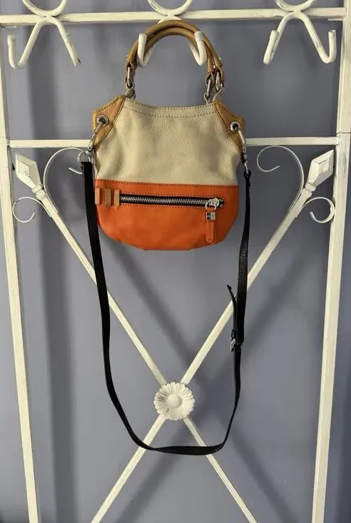 OrYANY Beige leather bag orange accents and a black strap Crossbody