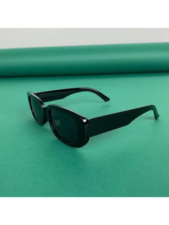 Minimalistic black sunglasses. UVA UVB protection