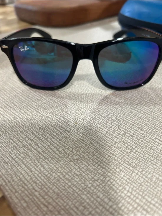 Ray-Ban Black Frame Sunglasses with Blue-Purple Mirrored Lenses