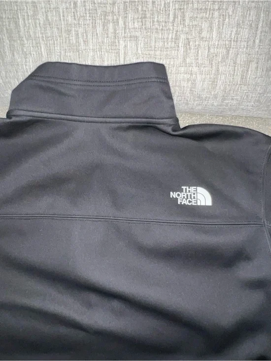 The North Face Men’s Black Performance Jacket with White Logo