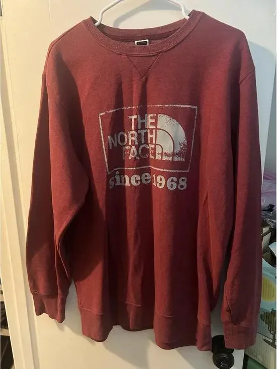 The North Face red sweatshirt with white logo and 'since 1968' text size L