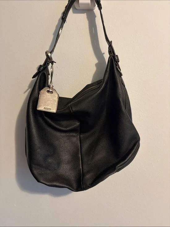 Black Pebbled Leather Hobo Bag with Silver Tag