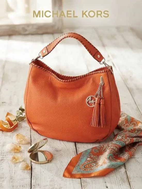 Michael Kors Orange Leather Whipstitch Tassel Hobo Bag