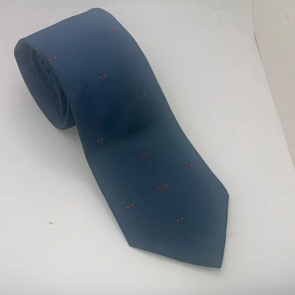 Christian Dior men’s tie. Polyester/silk blend.
