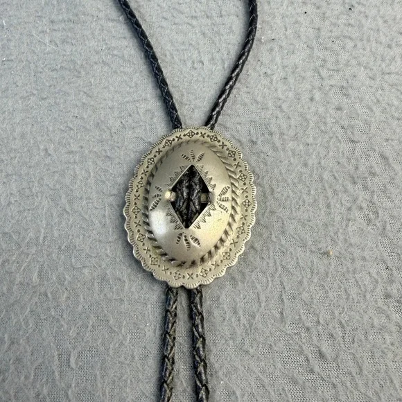 Vintage Western Bolo Tie Silver Tone Stamped Concho Black Braided Cord Cowboy