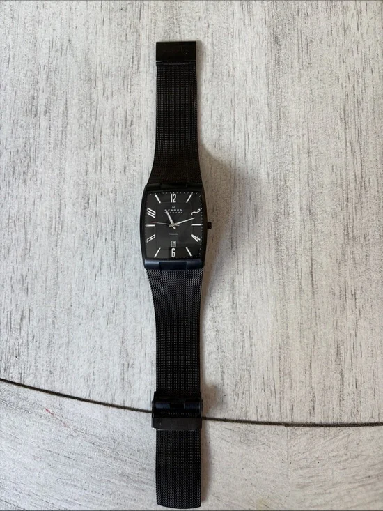 Skagen men’s watch square/rectangle face. Needs battery.
