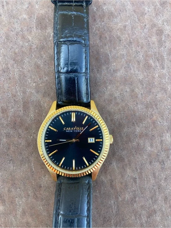 Caravelle by Bulova Men's Gold-Tone Strap Watch (Model 44B118) works great look