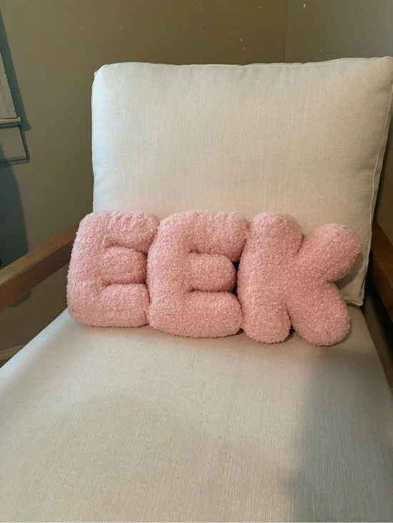 Plush 'E E K' pillow