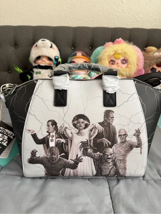 Loungefly Classic Monsters Satchel Bag - White & black. Comes with strap.