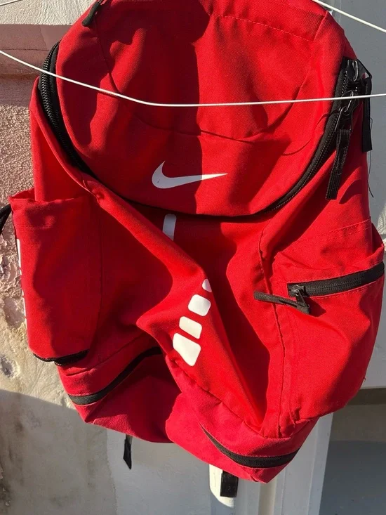 Nike Red Backpack with White Swoosh and Accents