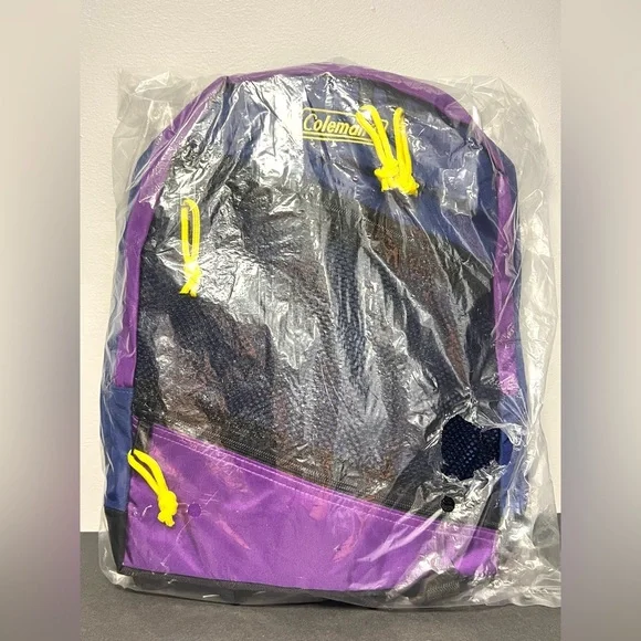 Coleman- Backpack, New in Bag, Around‎ 15.5 inches tall, Purple/Black/Yellow