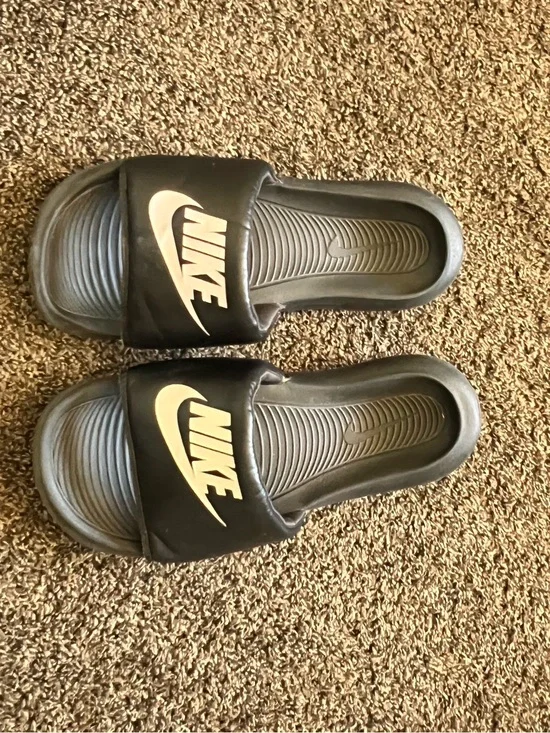 Nike Kids Black Slide Sandals with Gold Logo Accent