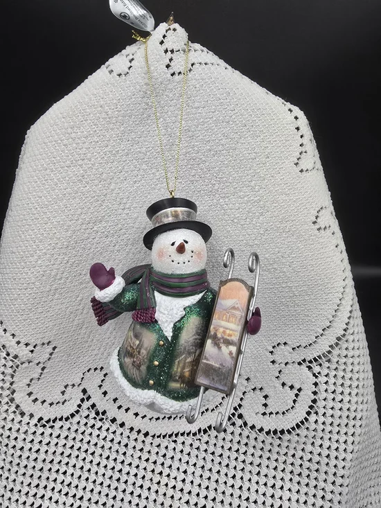 Thomas Kinkade Green and White Snowman Ornament with Purple Accents