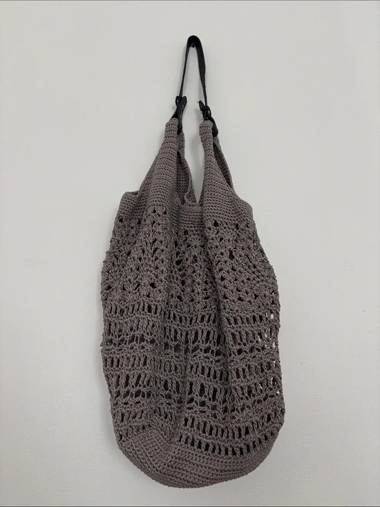 The Sak Crochet Tote Bag in Taupe with Black Handles