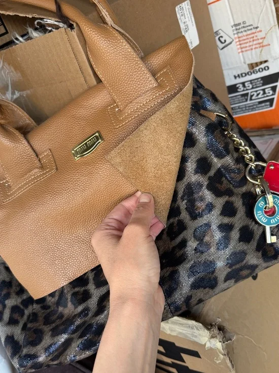 Genuine leather Leopard Print Tote with Tan Leather Trim and designer accents