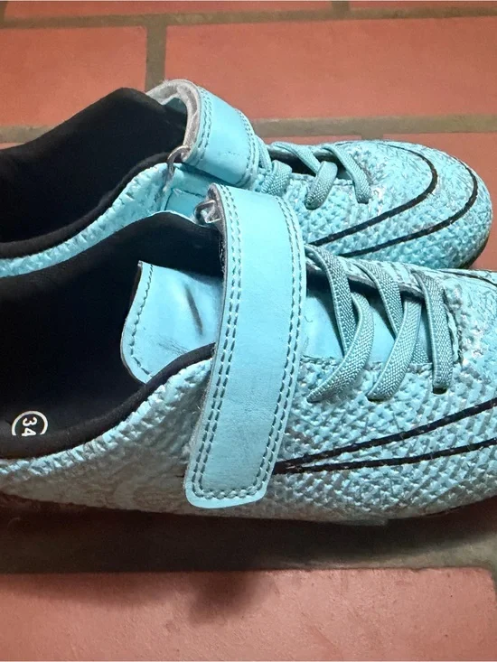 Kids Light Blue indoor soccer cleats with Hook-and-Loop Strap.