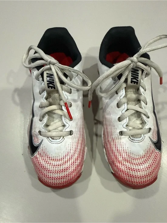 Nike Kids Vapor White and Red Gradient Football Cleats.