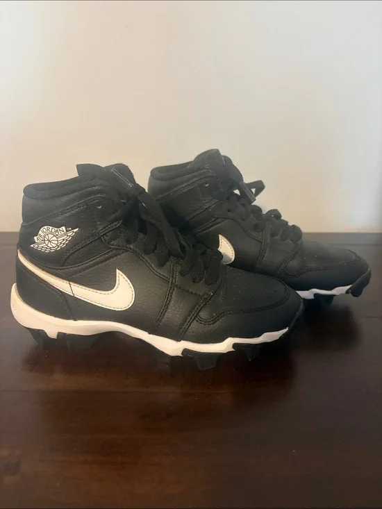 Jordan 1 Mid Cleats. Kids' Black and White High-Top.