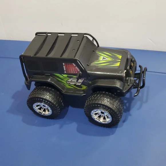 Black‎ and green kid's 4 wheel rugged monster truck style toy