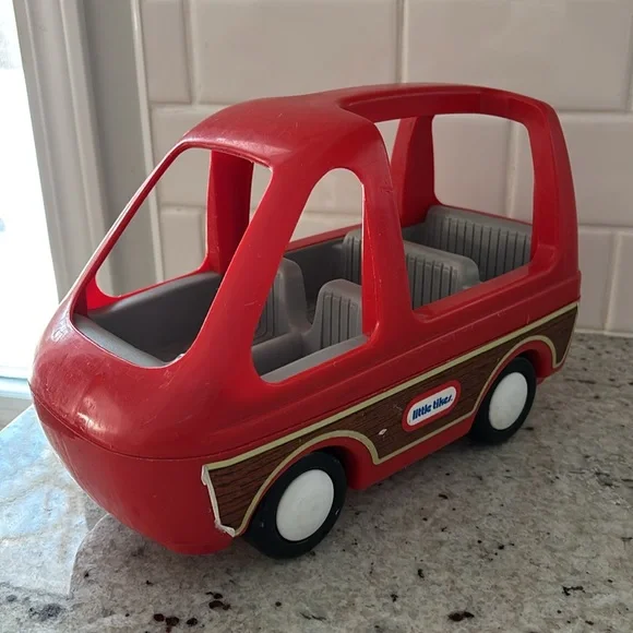 Vintage 90s Little Tikes red family van with wood paneling