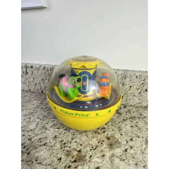 Vintage 1985 Fisher Price Roly Poly Chime Ball Carousel Yellow 1150 nostalgia