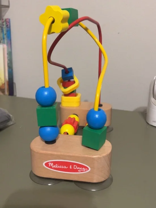 Melissa & Doug Wooden Bead Maze in Blue, Green, Yellow, Red