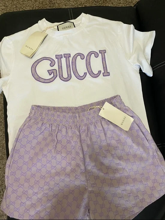 Gucci Women's White Tee and Lilac Logo Shorts Set