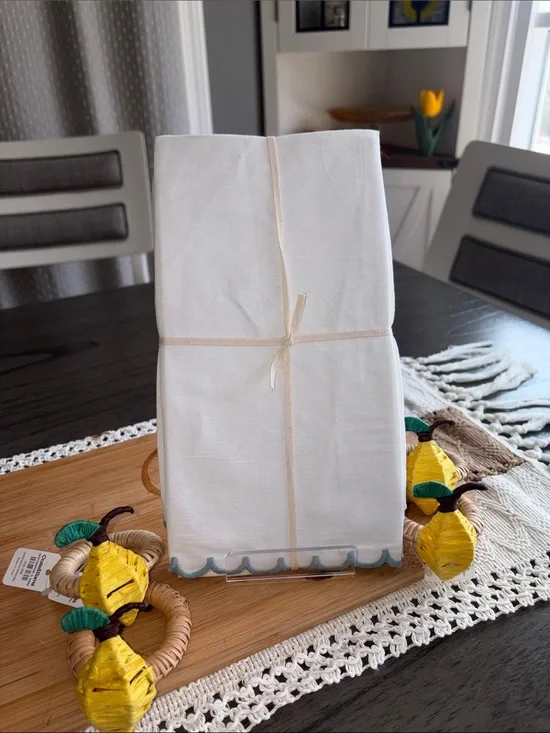 White Decorative Kitchen Napkins with Scalloped edges and 4 lemon napkins rings.