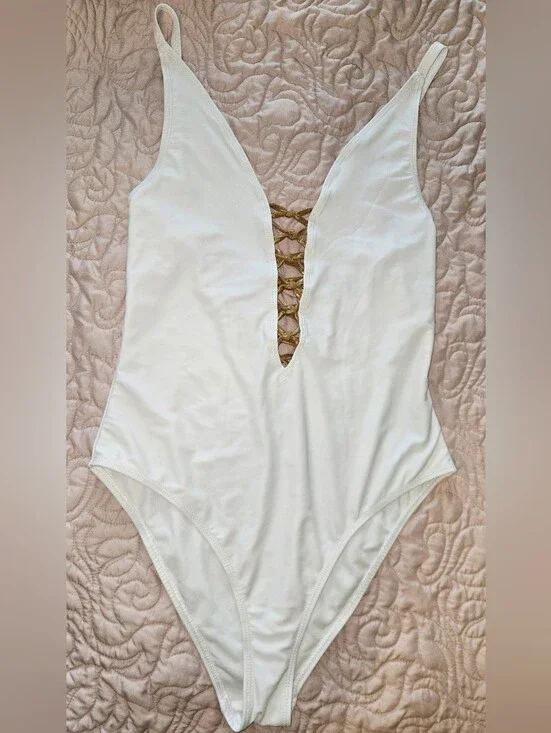 White Plunge One-Piece Swimsuit with Golden Lace-Up