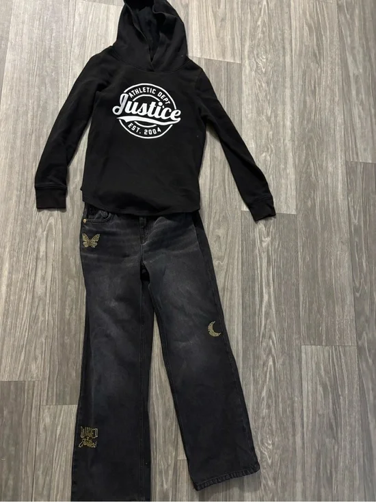 Justice Black Hoodie with Black Jeans and Gold Embellishments