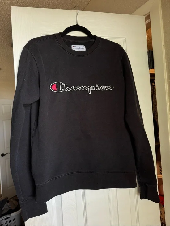 Champion Black Crewneck Sweatshirt with Script Logo and Pink Accent