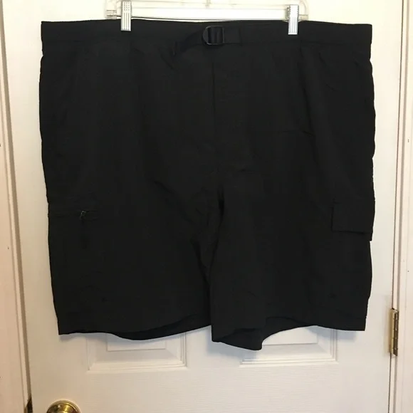 Men’s Columbia black swim trunks sz XXL. Net lined, zipper & Velcro pockets.