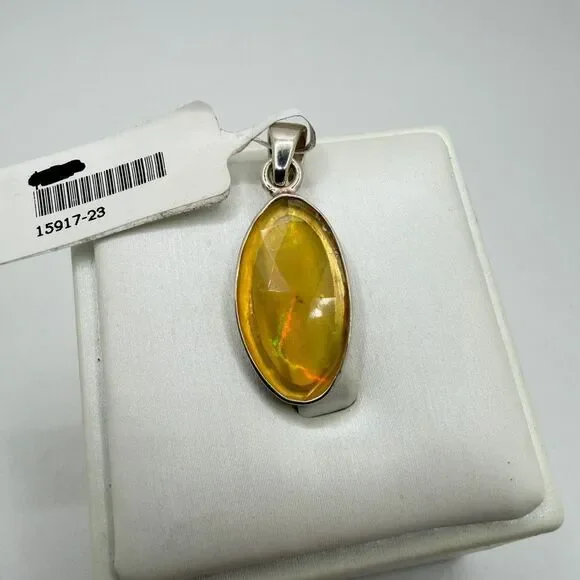 NWT‎ 12x22mm faceted oval cut OPAL pendant in sterling silver!