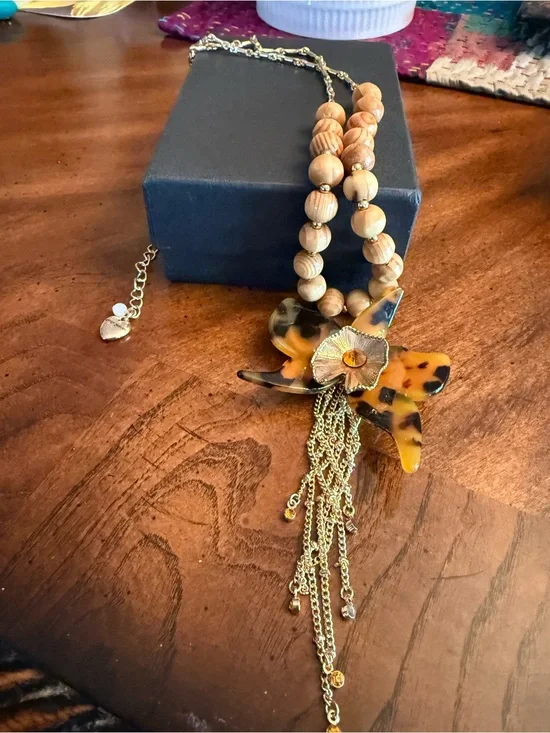 Betsy Johnson Wood Bead Necklace with Tortoiseshell Flower Pendant - Gold Accent